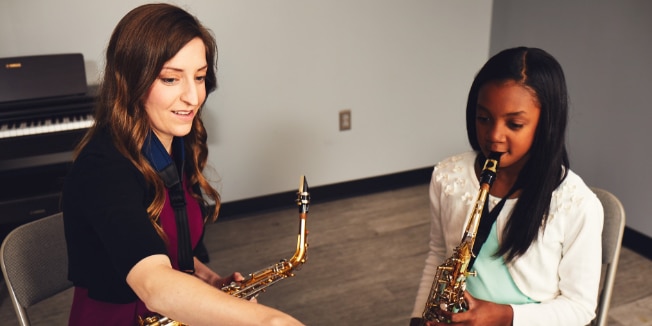 A music instructor and her student