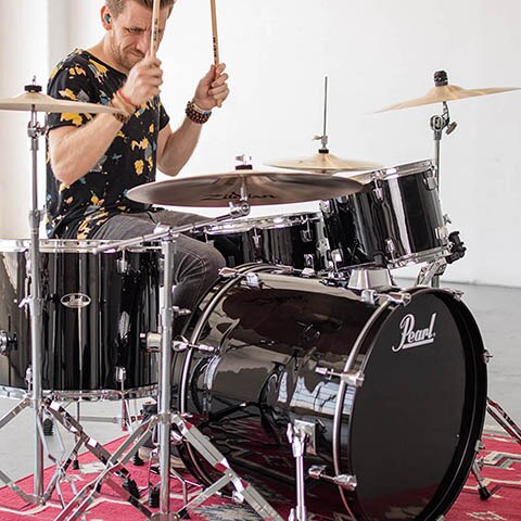 man playing drums