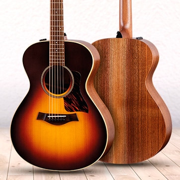 New Taylor A.D.12e. American-made Grand Concert acoustic-electric in stunning sunburst. Shop Now