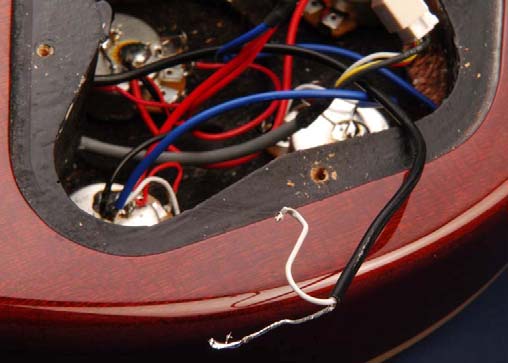 Unsolder and remove epiphone pickup wires