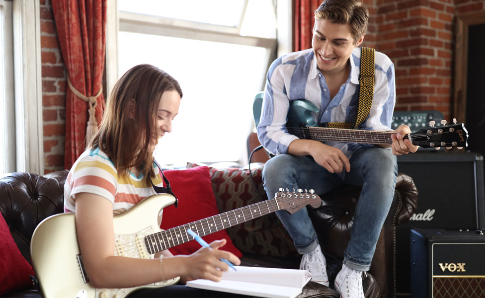 Ben Provest and Maddie Jay at a co-writing session with a Fender Stratocaster and Gibson SG