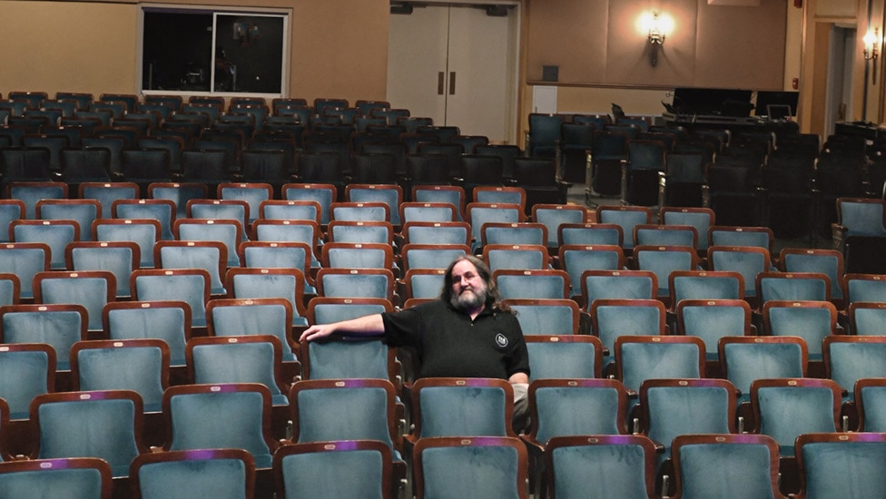 Wayne Sowder sitting out in the house at Carolina Theater