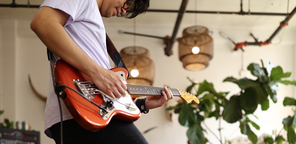 Ryan Silo playing his Fender Johnny Marr Jaguar electric guitar