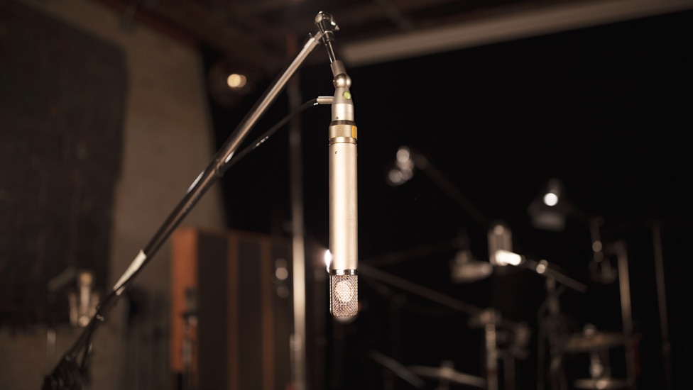 A vintage AKG C12 makes a great room microphone for drums.